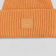 Acne Studio Large Face Beanie in Orange
