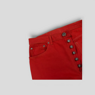 CLB XXIII red cotton Levi jeans featuring signature Chrome Hearts silver cross button fly and hardware details