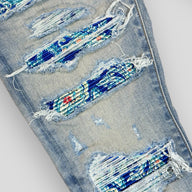 Amiri MX1 Silk PJ Thrasher Jeans in Clay Indigo