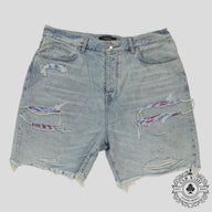Amiri Tie Dye Thrasher Jean Shorts in Light Wash