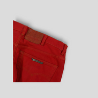 CLB XXIII Chrome Hearts Levi red cotton jeans featuring a leather patch and signature silver hardware detail