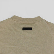 Fear of God Essentials Long Sleeve in Heather Gold