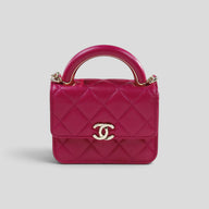 Chanel Lambskin Quilted Top Handle Clutch in Pink
