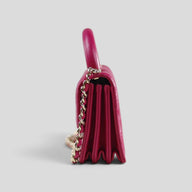 Chanel Lambskin Quilted Top Handle Clutch in Pink