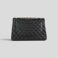 Chanel Caviar Leather Jumbo Quilted Flap Bag in Black