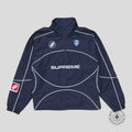 Supreme Reflective Piping Pullover in Navy