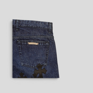 CLB XXIII Chrome Hearts dark wash cotton jeans featuring black leather fleur knee cross patches and back pocket logo