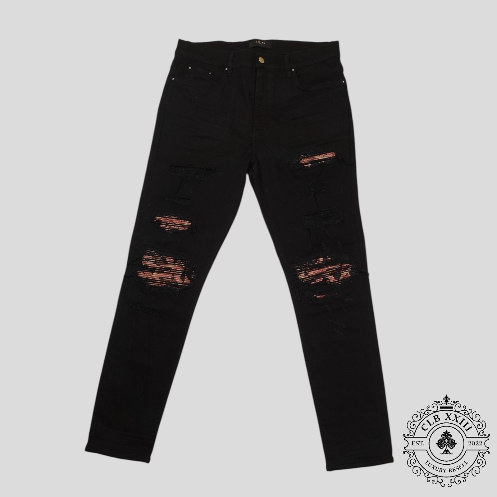 Amiri Banana Leaf Patch Thrasher Jeans in Black