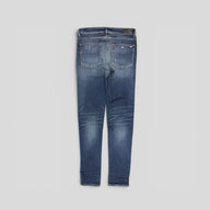 Amiri MX1 Leather Patch Jeans in Deep Classic Wash