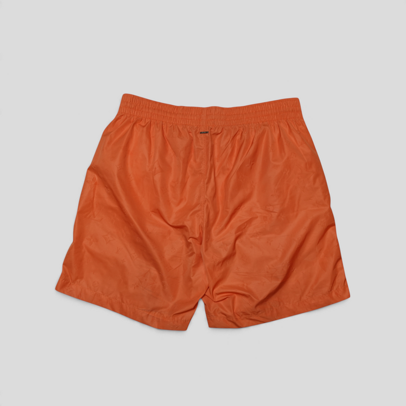 CLB XXIII Louis Vuitton orange polyester swim board shorts with subtle monogram pattern and elastic waistband