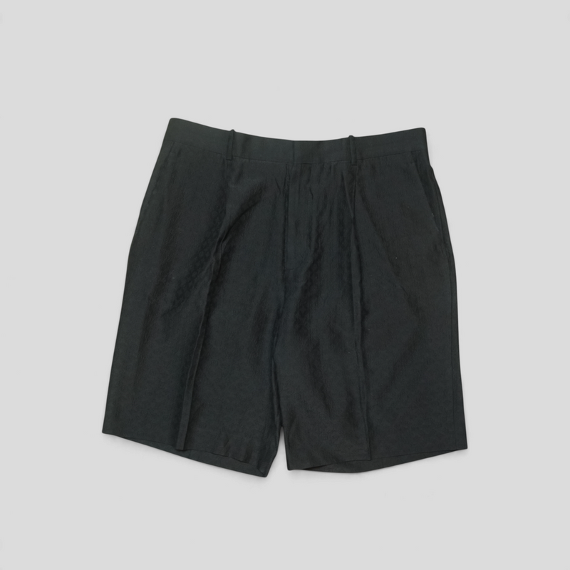 CLB XXIII black Louis Vuitton monogram silk and cotton blend tailored shorts with a subtle embossed pattern.