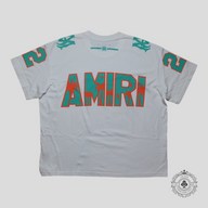 Amiri Palm Tree 22 Oversized Football T-Shirt in White/Mint Green/Orange