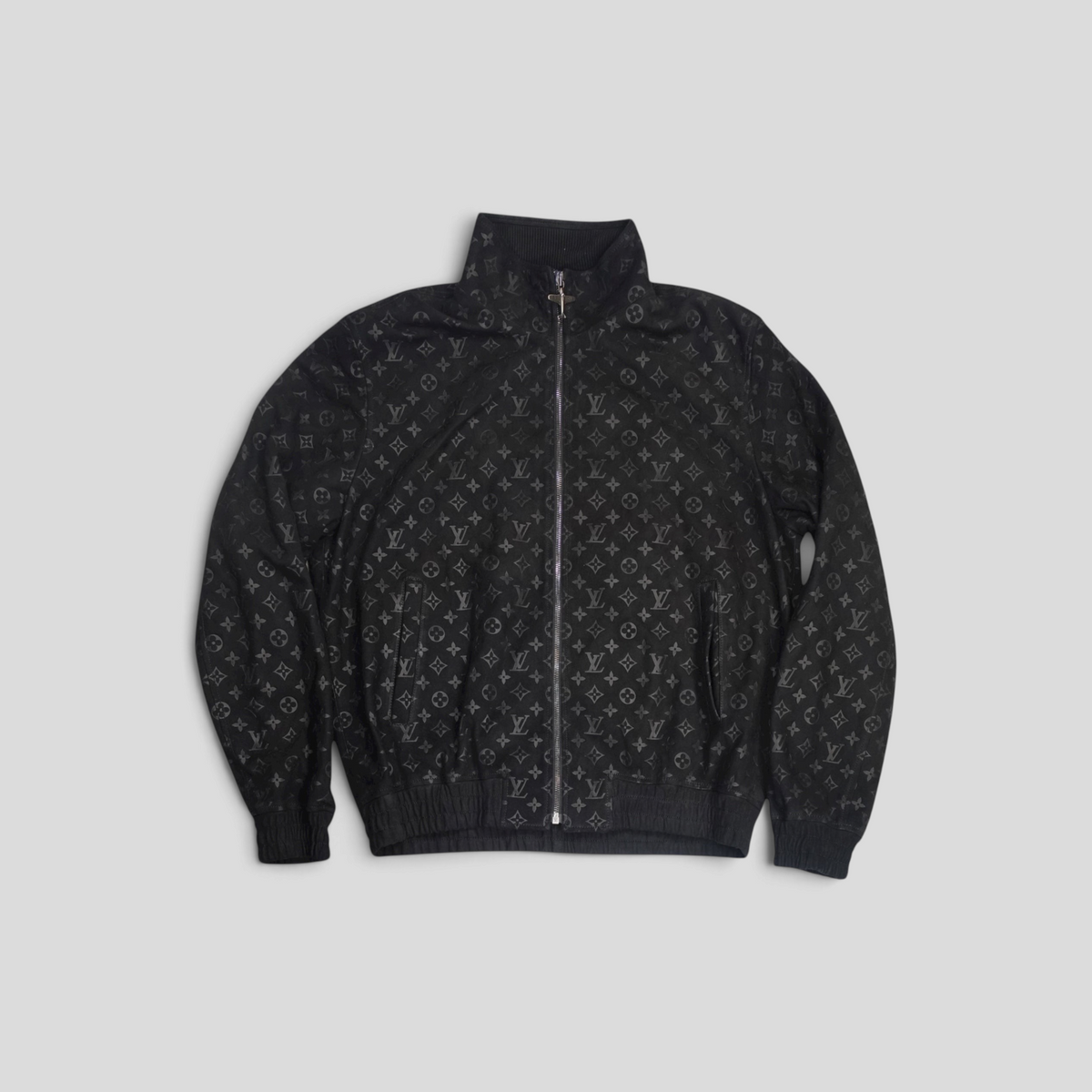 CLB XXIII black Louis Vuitton lamb leather tracksuit jacket featuring an embossed monogram pattern and zip front