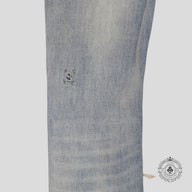 Serenede Distressed Fitted Denim Jeans in Light Wash