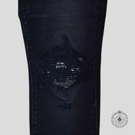 Amiri MX1 Bandana Patch Jeans in Aged Black