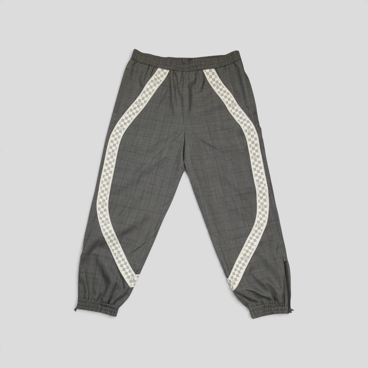 CLB XXIII Louis Vuitton grey wool track pants featuring a white checkered side stripe and elasticated cuffs.