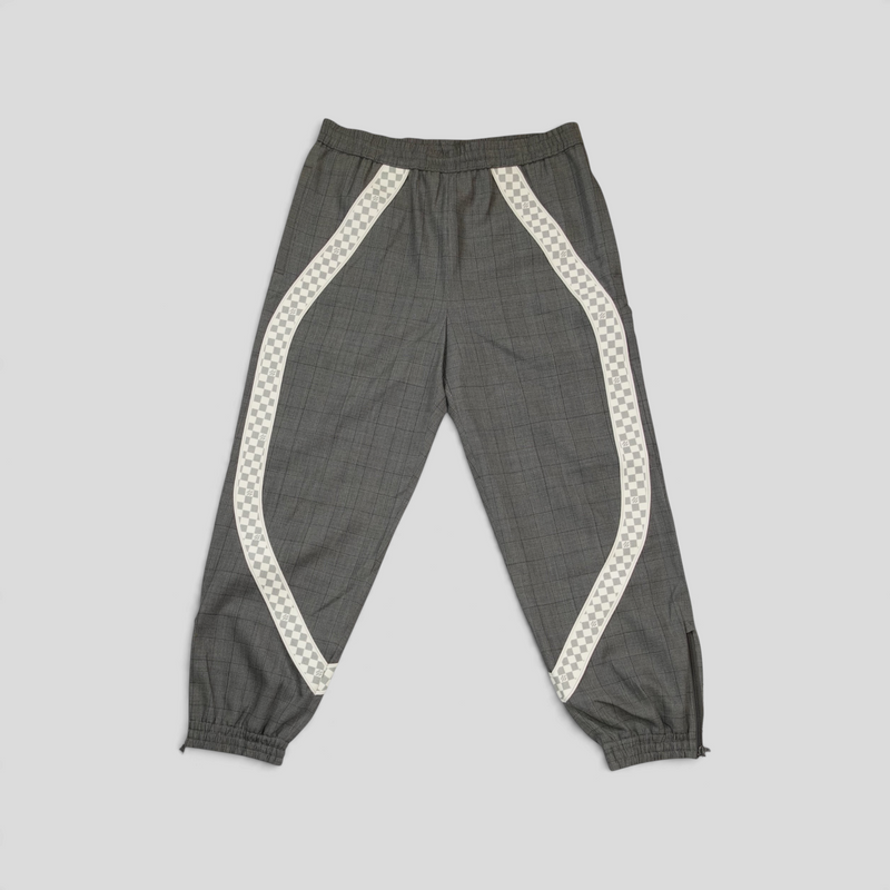 CLB XXIII Louis Vuitton grey wool track pants featuring a white checkered side stripe and elasticated cuffs.
