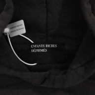 Enfants Riches Deprimes Head Against The Bars in Washed Black