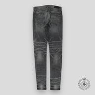 Amiri Faded Denim Jeans in Grey