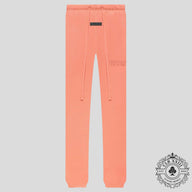 Fear Of God Essentials Sweatpants in Coral