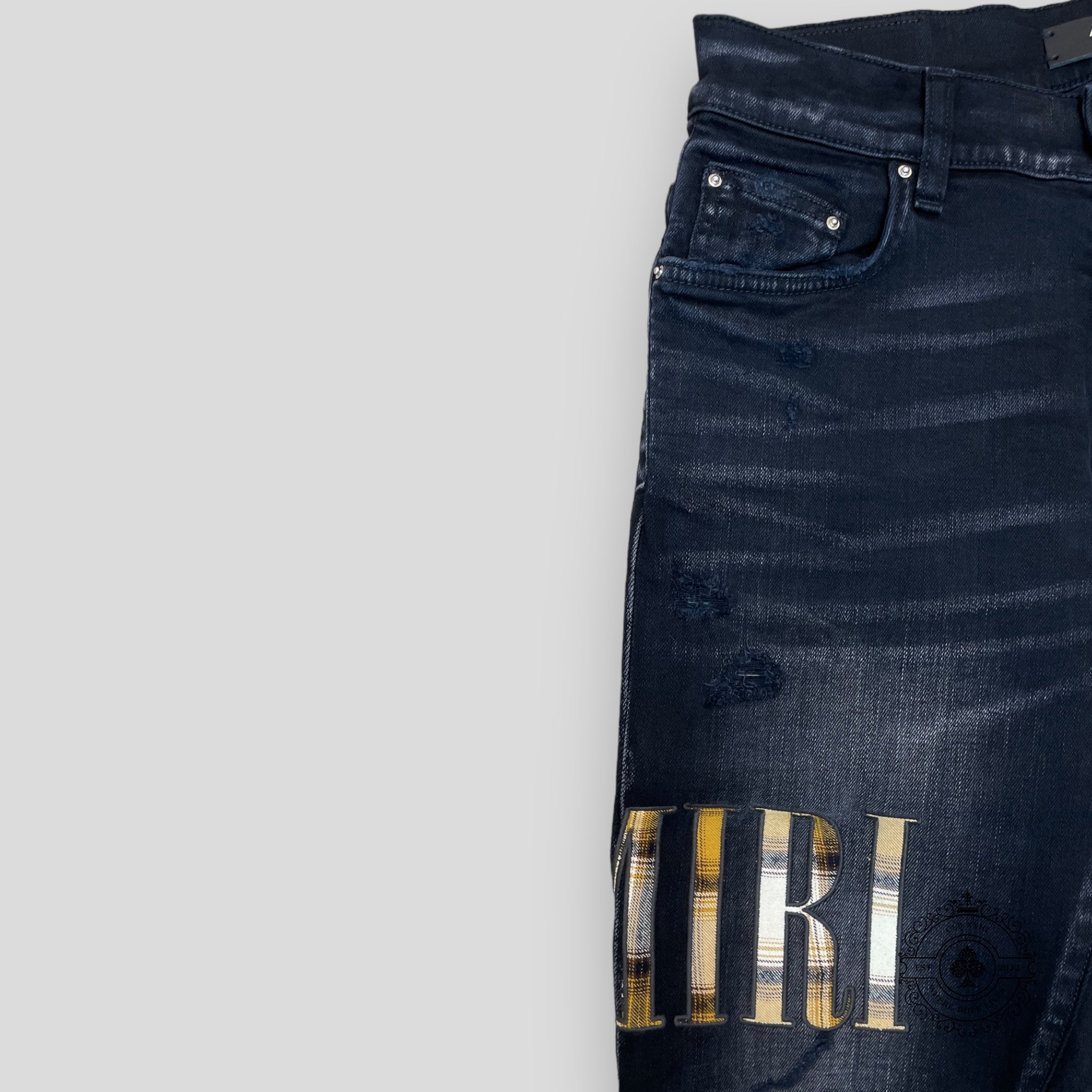 Amiri Flannel Core Logo Jeans in Aged Black