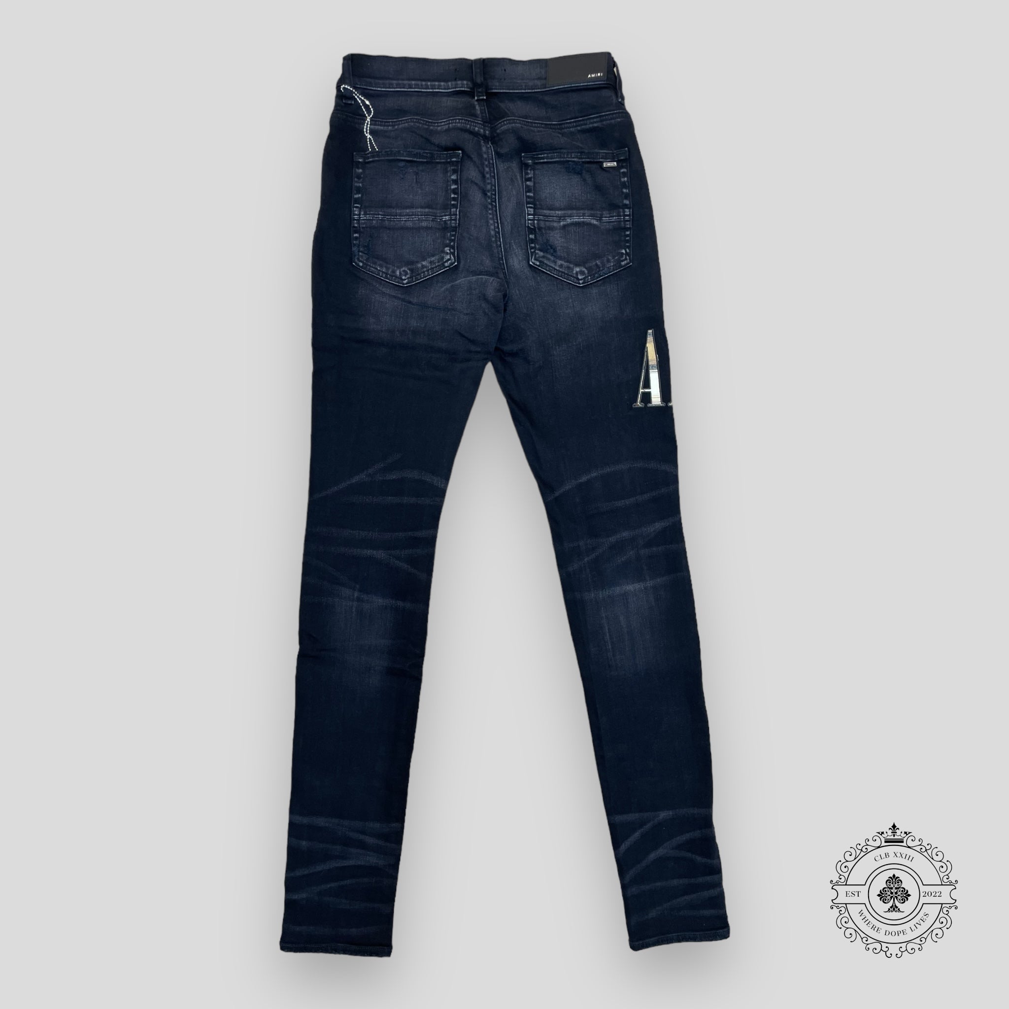 Amiri Flannel Core Logo Jeans in Aged Black