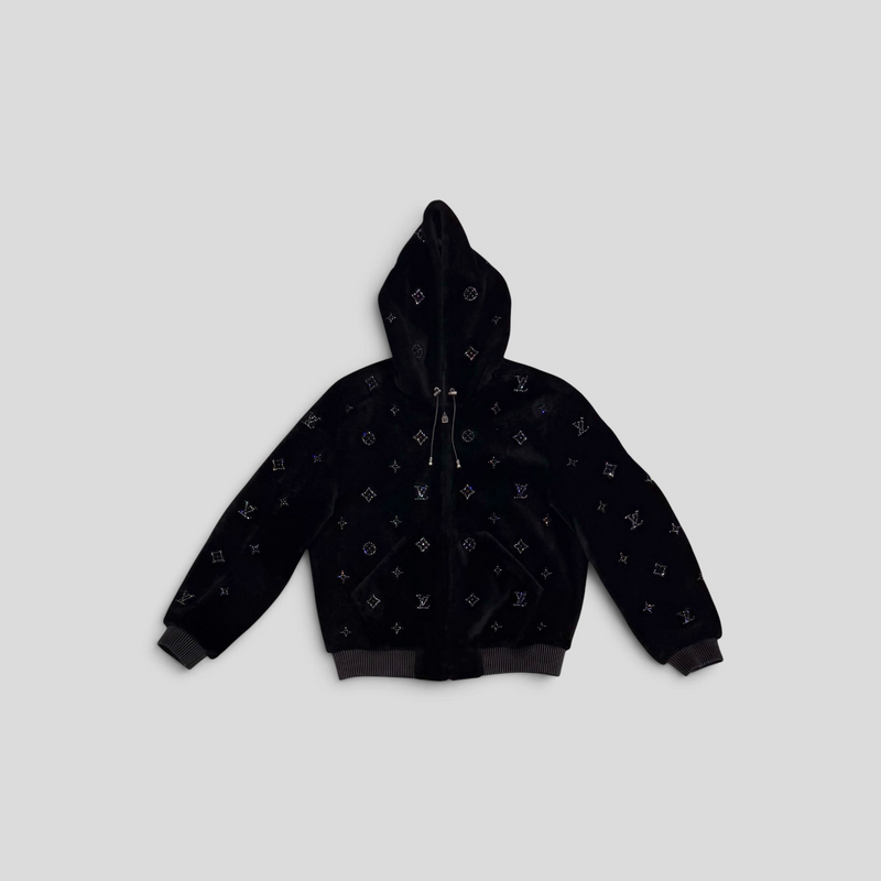 CLB XXIII black shearling hoodie featuring Louis Vuitton monogram crystal embellishments and a front zip closure.