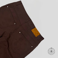 Louis Vuitton Monogram Embossed Carpenter Pants in Brown