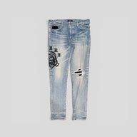 Amiri X Wes Lang Reaper Logo Jeans in Clay Indigo
