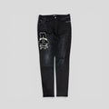 Amiri Varsity Patch Jeans in Aged Black