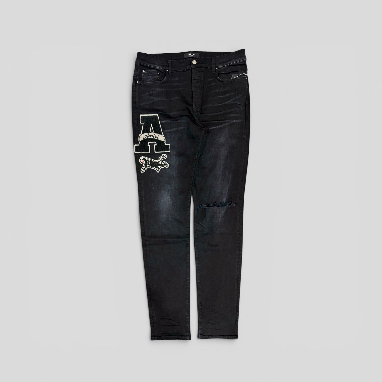 Amiri Varsity Patch Jeans in Aged Black