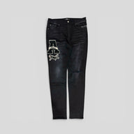 Amiri Varsity Patch Jeans in Aged Black