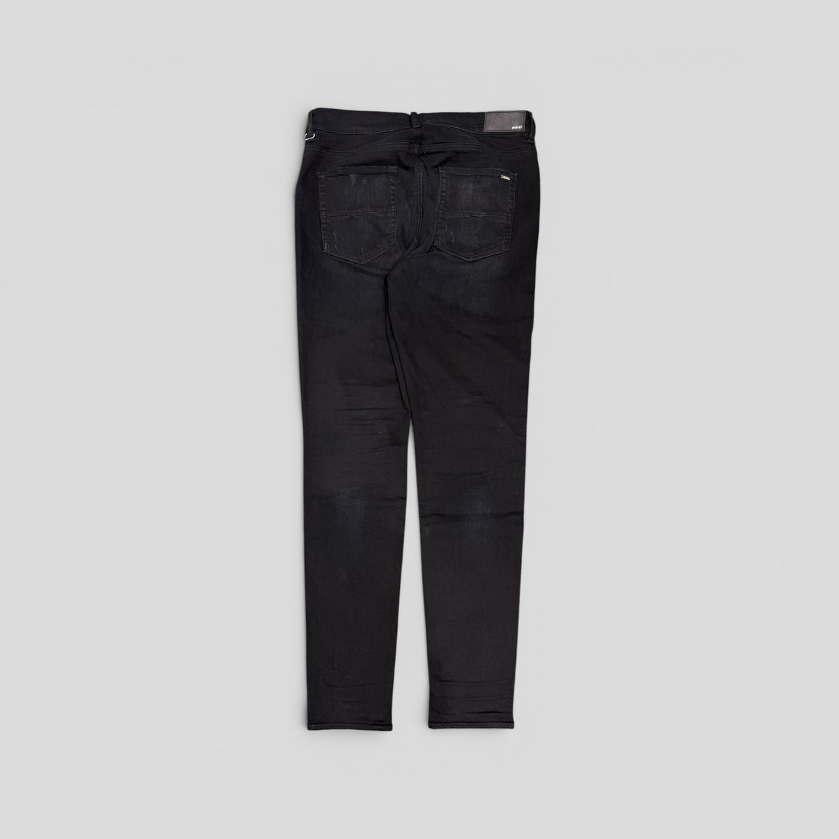 Amiri Varsity Patch Jeans in Aged Black