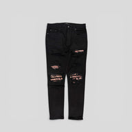 Amiri Banana Leaf Patch Thrasher Jeans in Black