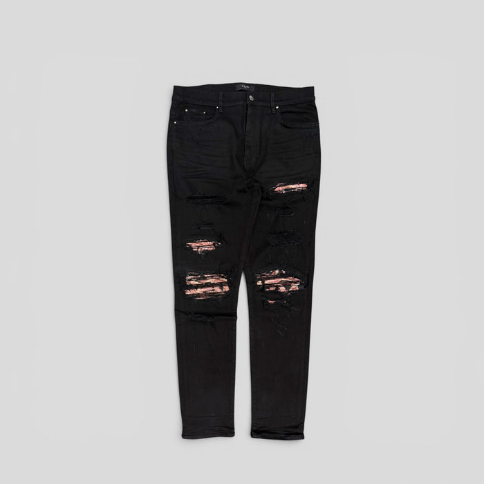 Amiri Banana Leaf Patch Thrasher Jeans in Black