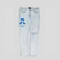 Amiri Varsity Patch Jeans in Vintage Sky Indigo