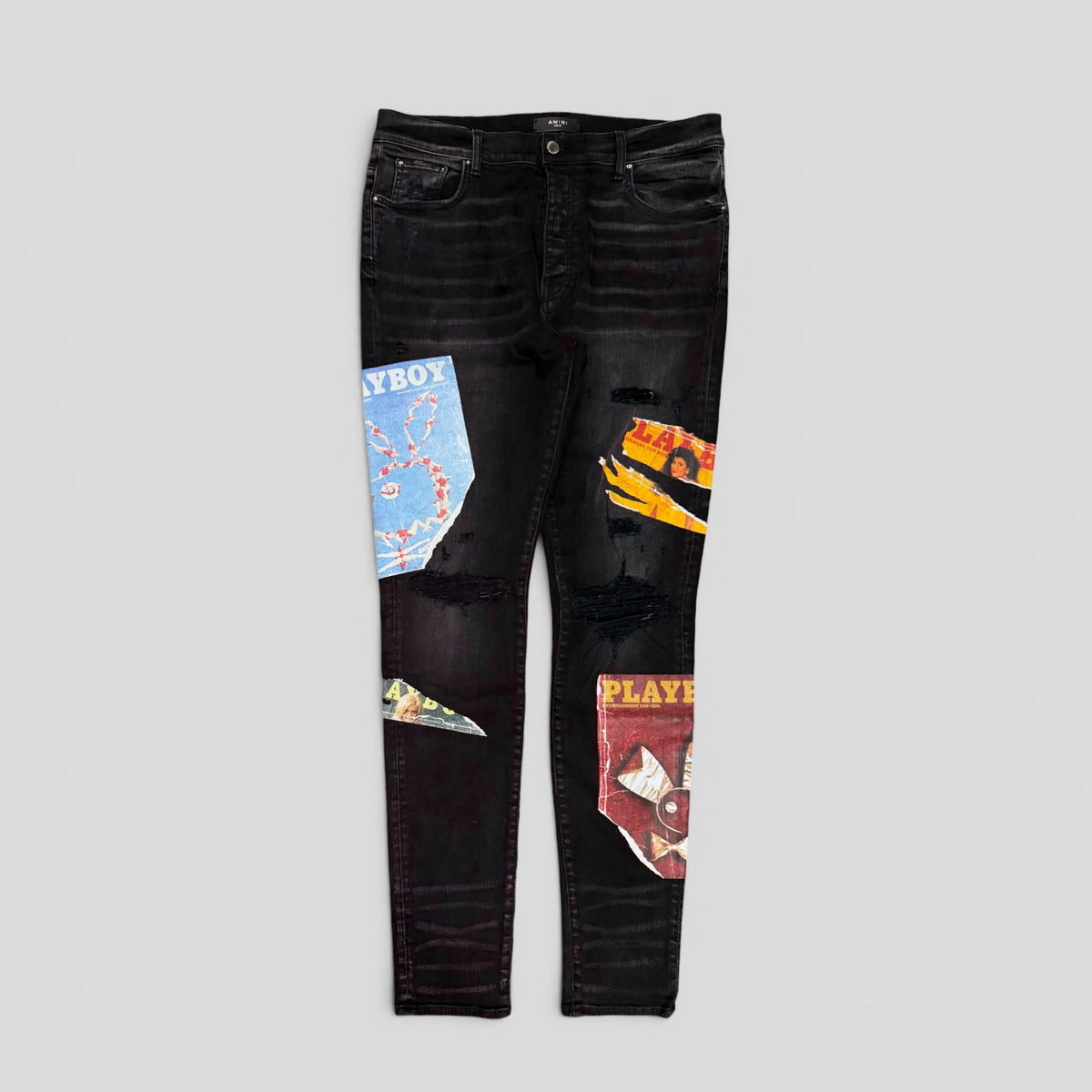 Amiri Playboy Magazine Skinny Jeans in Aged Black
