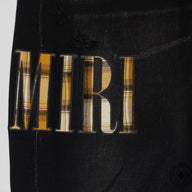 Amiri Core Applique Jeans in Aged Black
