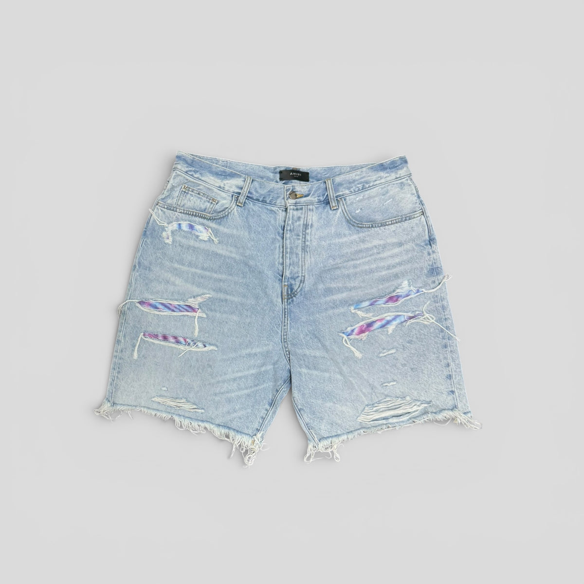 Amiri Tie Dye Thrasher Jean Shorts in Light Wash