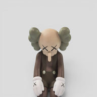 Kaws Small Lie Companion Vinyl Figure in Brown