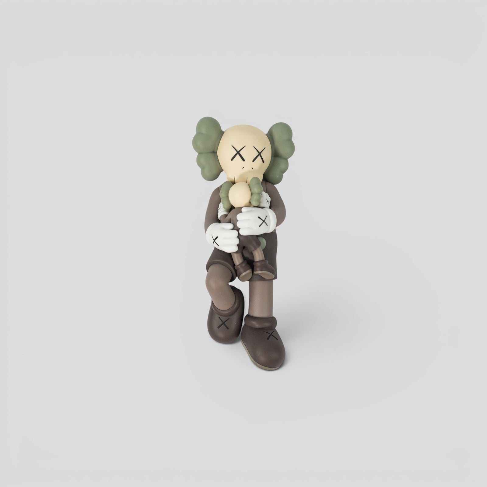 Kaws Holiday Singapore Vinyl Figure in Brown