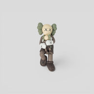 Kaws Holiday Singapore Vinyl Figure in Brown