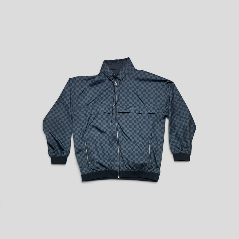 CLB XXIII Louis Vuitton black reversible windbreaker featuring a checkered Damier pattern and full zip closure.