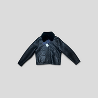 CLB XXIII Louis Vuitton black shearling jacket featuring an embossed monogram pattern and a plush collar