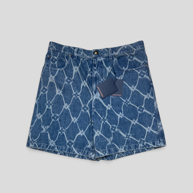 CLB XXIII Louis Vuitton medium wash denim shorts featuring a white fishnet monogram pattern and brand tags attached.