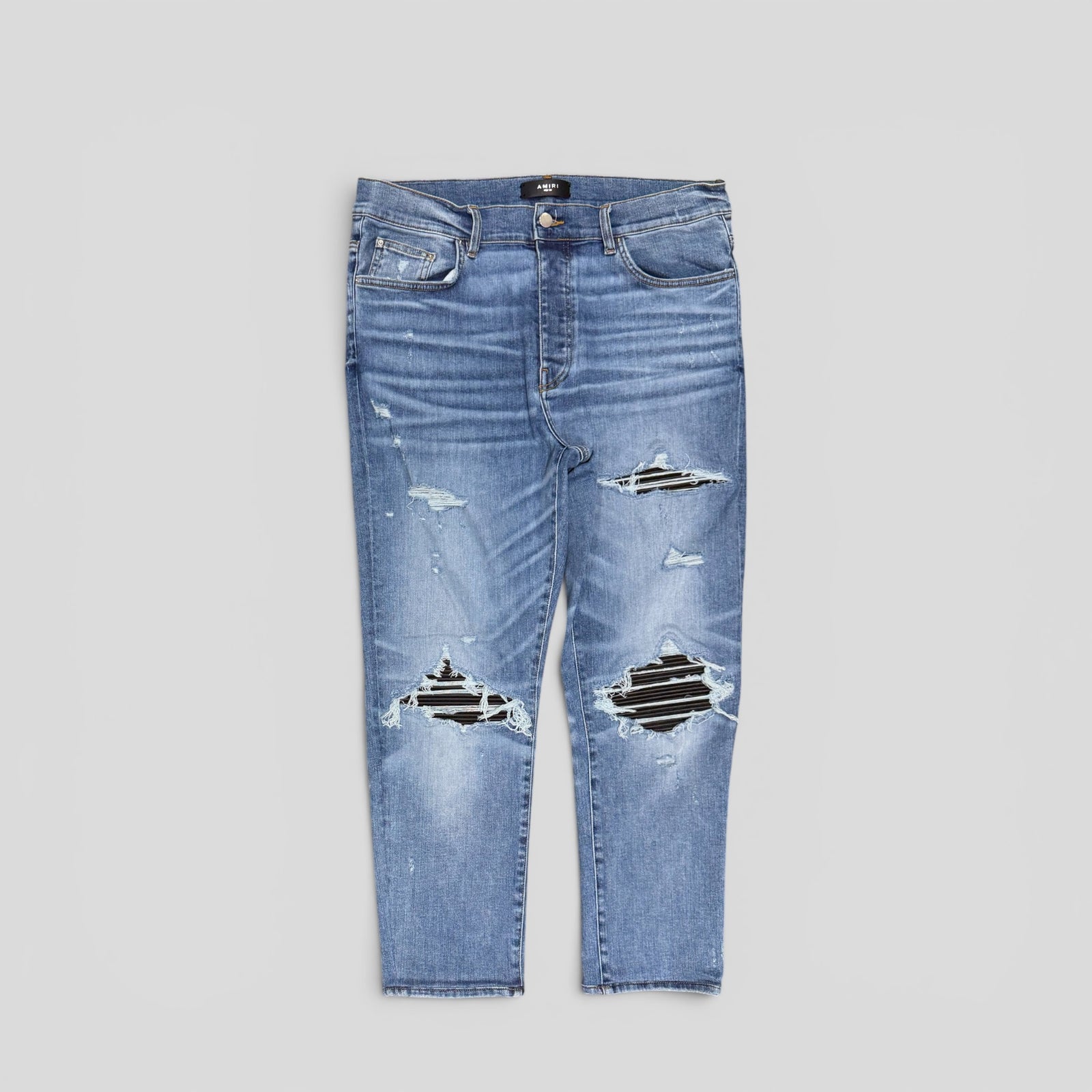 Amiri MX1 Leather Patch Jeans in Classic Wash