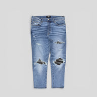 Amiri MX1 Leather Patch Jeans in Classic Wash