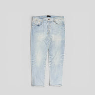 Amiri Distressed Jeans in Light Wash