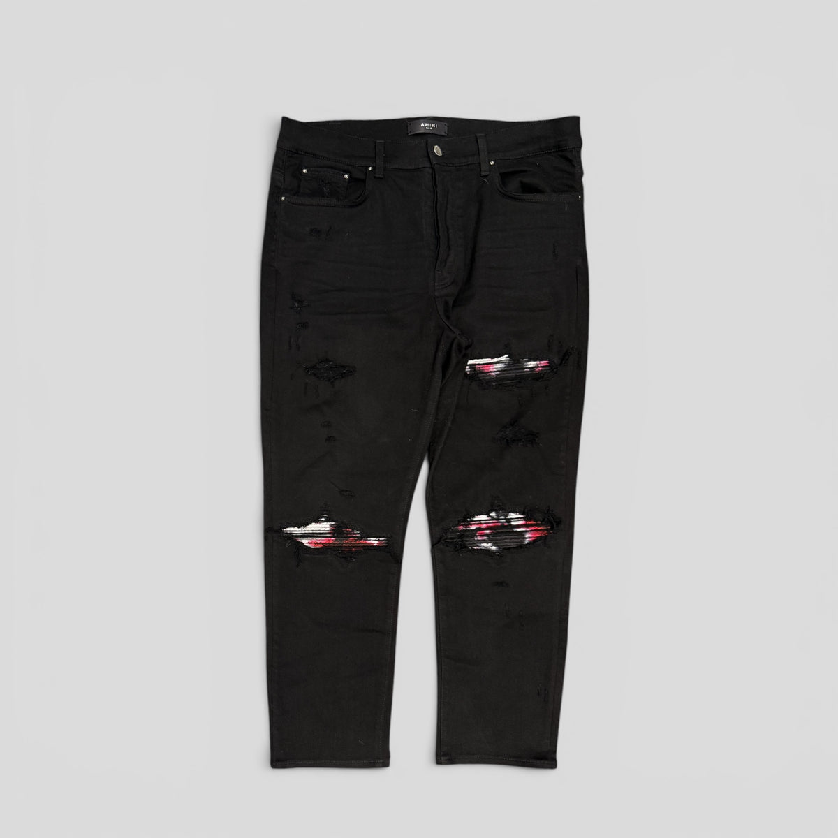 Amiri Tie Dye Patch Jeans in Black/Red