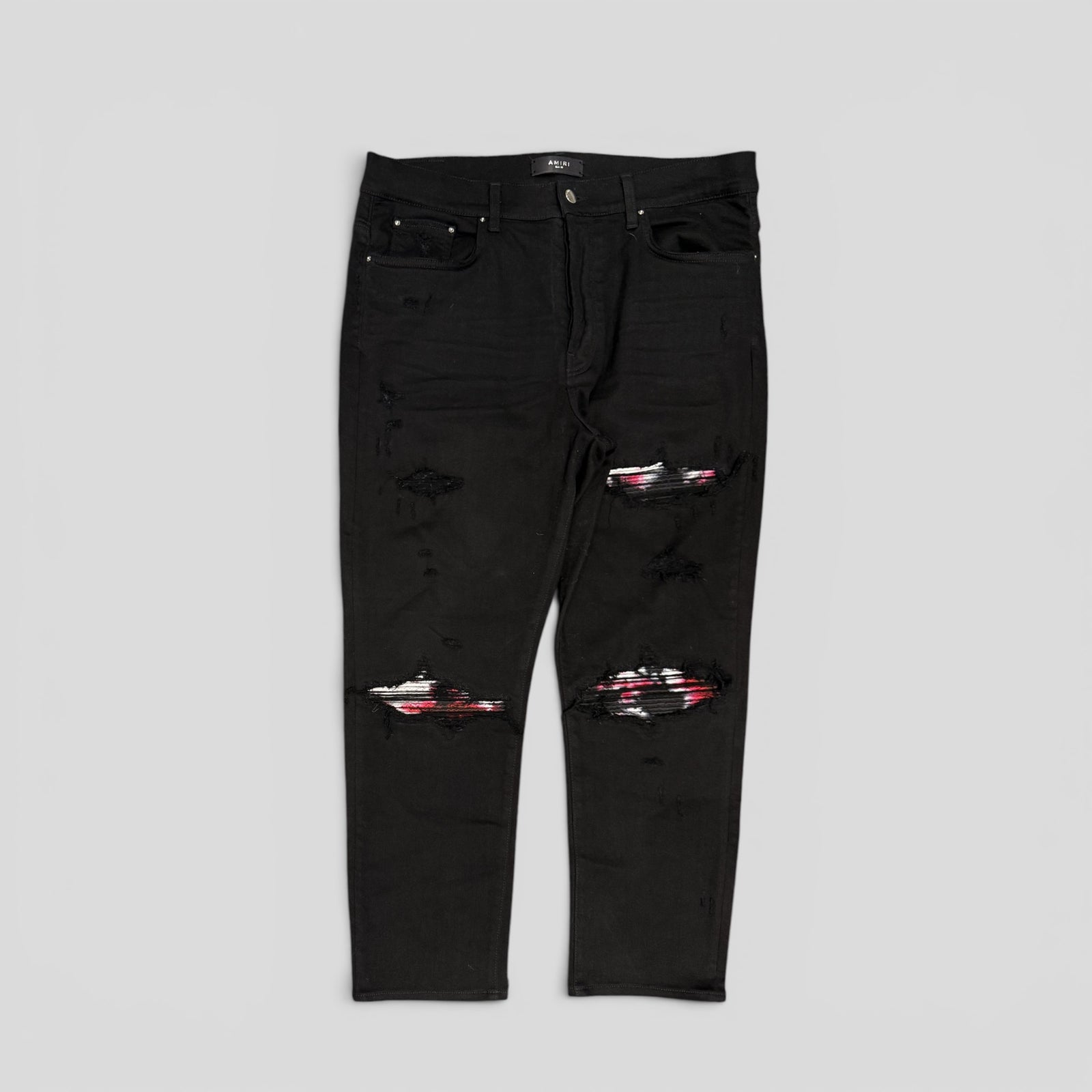 Amiri Tie Dye Patch Jeans in Black/Red